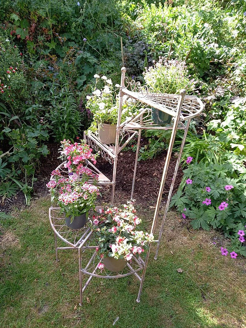 Spiral Staircase Tiered Pot Holder With Six Levels 1 Spiral Staircase Tiered Pot Holder With Six Levels